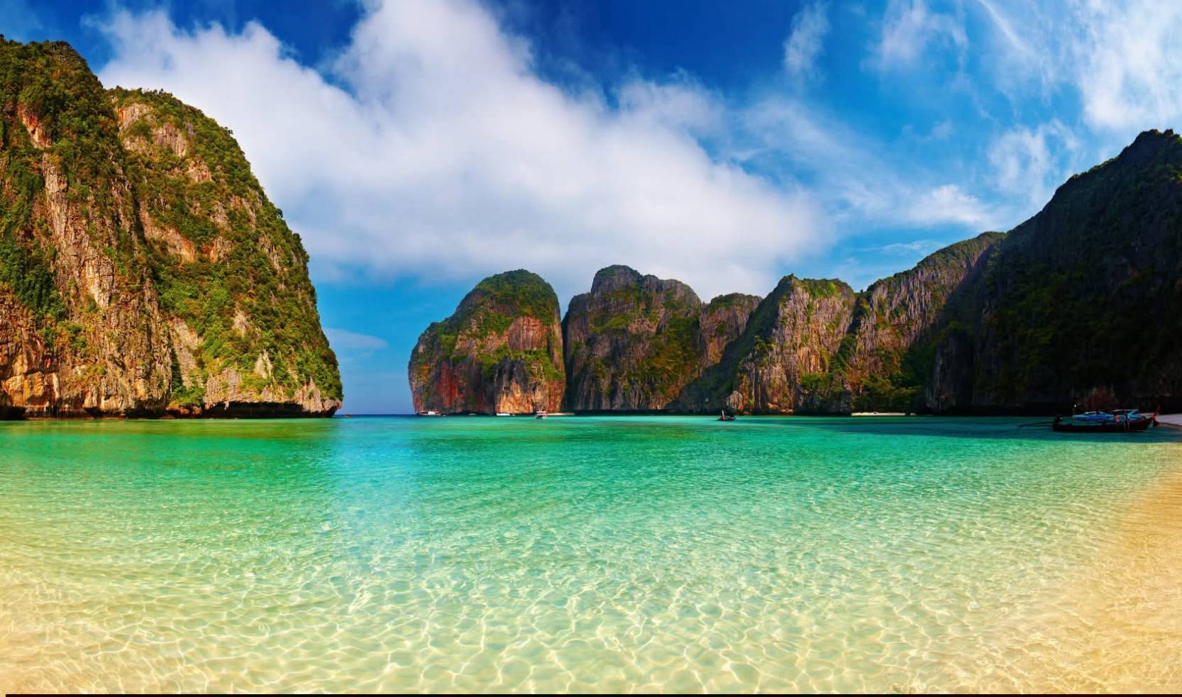 Explore Phi Phi Leh, Loh Sama Bay, and Maya Bay by speedboat. - Image 2