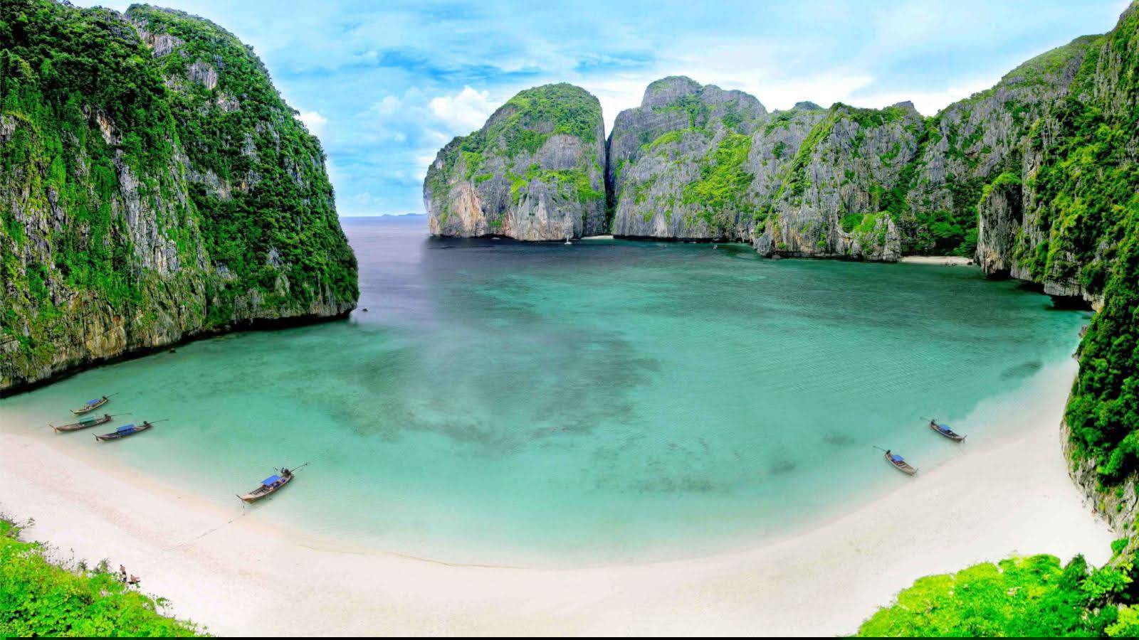 Explore Phi Phi Leh, Loh Sama Bay, and Maya Bay by speedboat. - Image 3